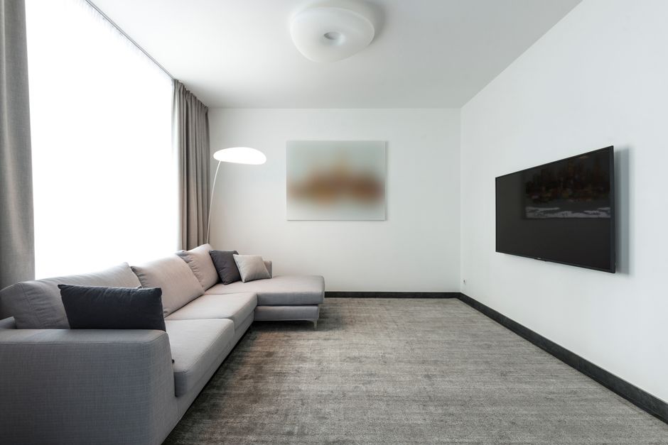 Clean living room carpet showcasing steam cleaning results